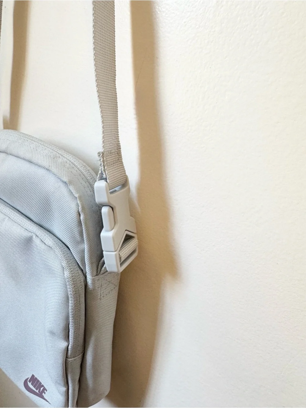 Nike Small Light Blue Crossbody Bag with Purple Logo
